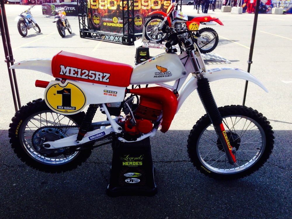 A vintage factory Honda with a number 1 plate on display, photographed by Tony Blazier