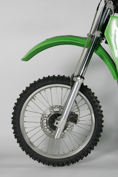 This front end may look pretty stock, but a closer inspection reveals hand machined lower forks and works triple clamps. It