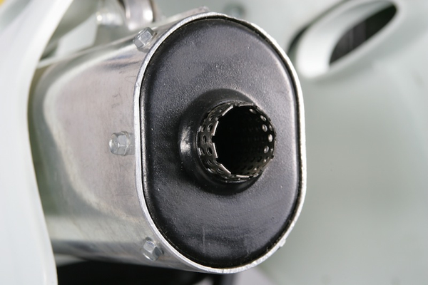 The big KTM 550 actually came equipped with three separate mufflers. There was a traditional silencer, a pre-muffler